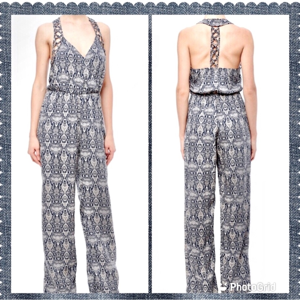 Vici jumpsuit by Aakaa beautiful semi open back, excellent condition RE $79🎉SALE